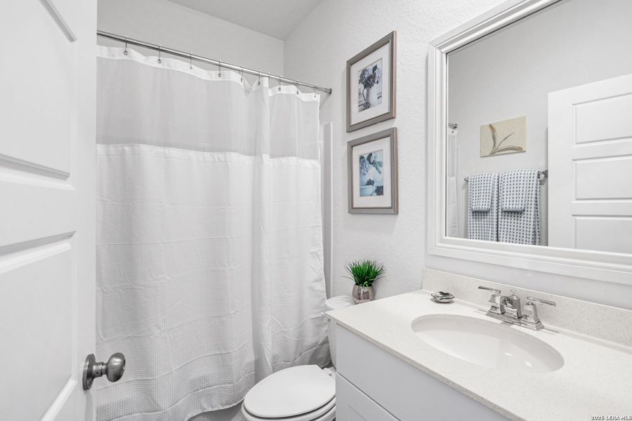 Furnished interior view inside a new home in Corley Farms, Boerne (Image 28).