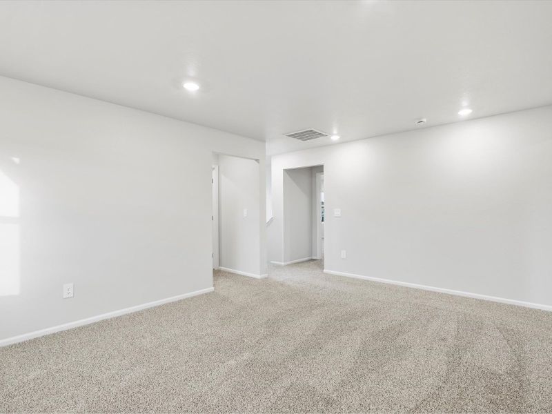 Spacious, unfurnished interior of a new home in Poudre Heights: The Lakes Collection, Windsor (Image 14). Spacious, unfurnished interior of a new home in Poudre Heights: The Lakes Collection, Windsor (Image 14).