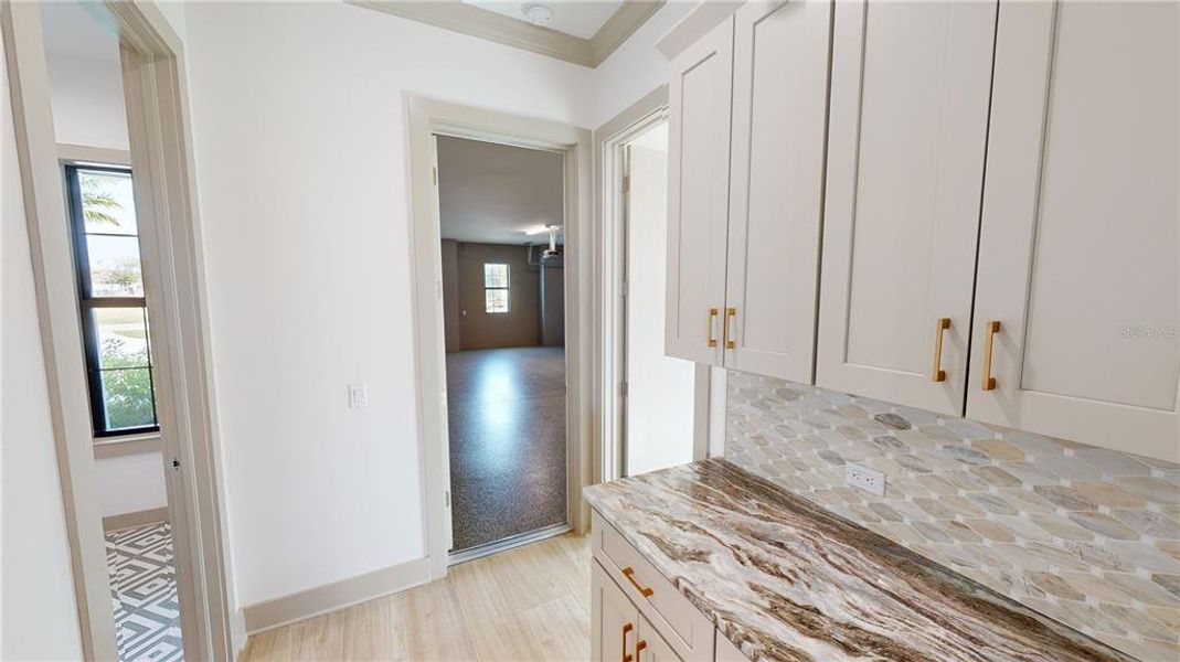 Garage foyer, laundry room and ensuite guest room