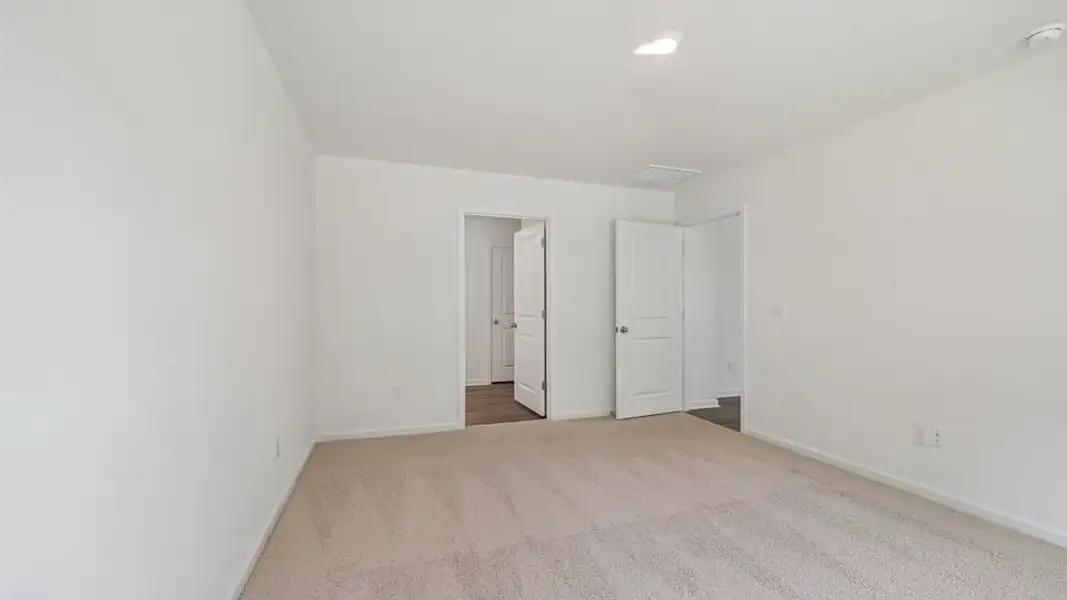 Spacious, unfurnished interior of a new home in Mangum Farms, Stem (Image 26).