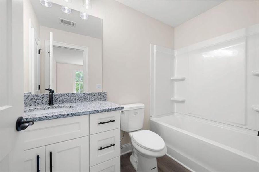 Furnished interior view inside a new home in , Dallas (Image 12).