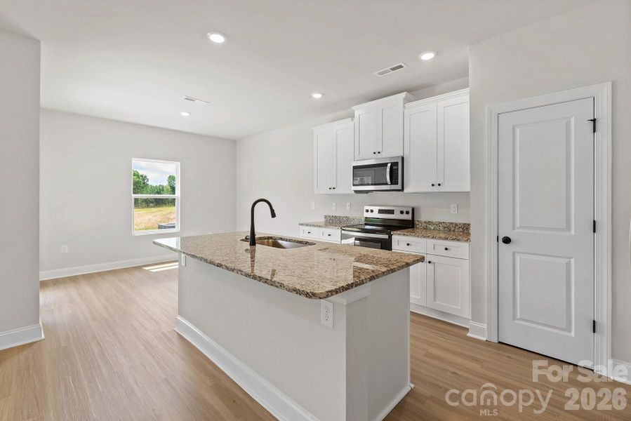 Furnished interior view inside a new home in Ascot Woods, Charlotte (Image 3).