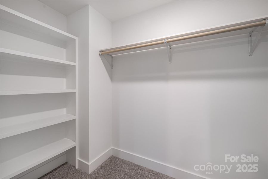 Walk in closet- primary bedroom Walk in closet- primary bedroom