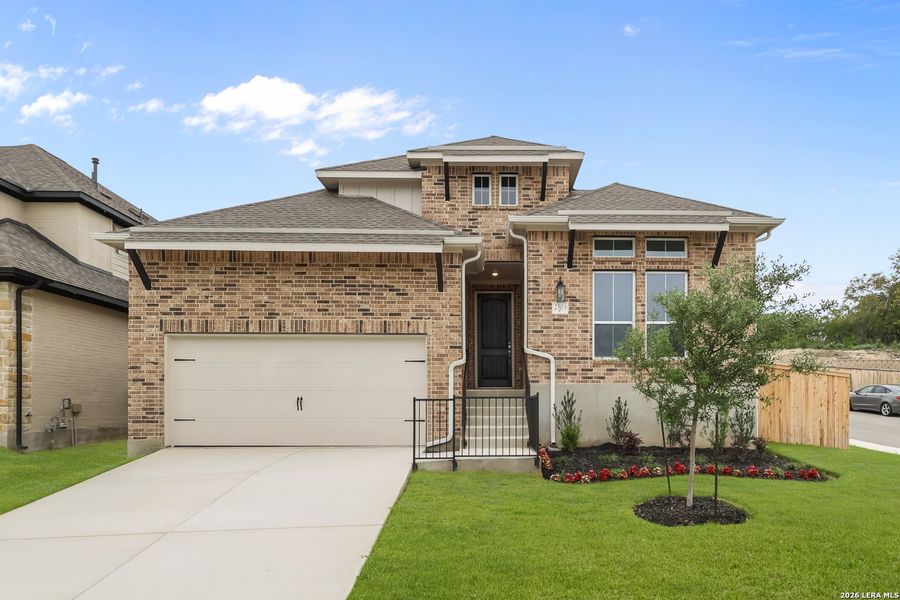 Front exterior of a new home in Ladera, San Antonio, TX, highlighting curb appeal (Image 1). Front exterior of a new home in Ladera, San Antonio, TX, highlighting curb appeal (Image 1).
