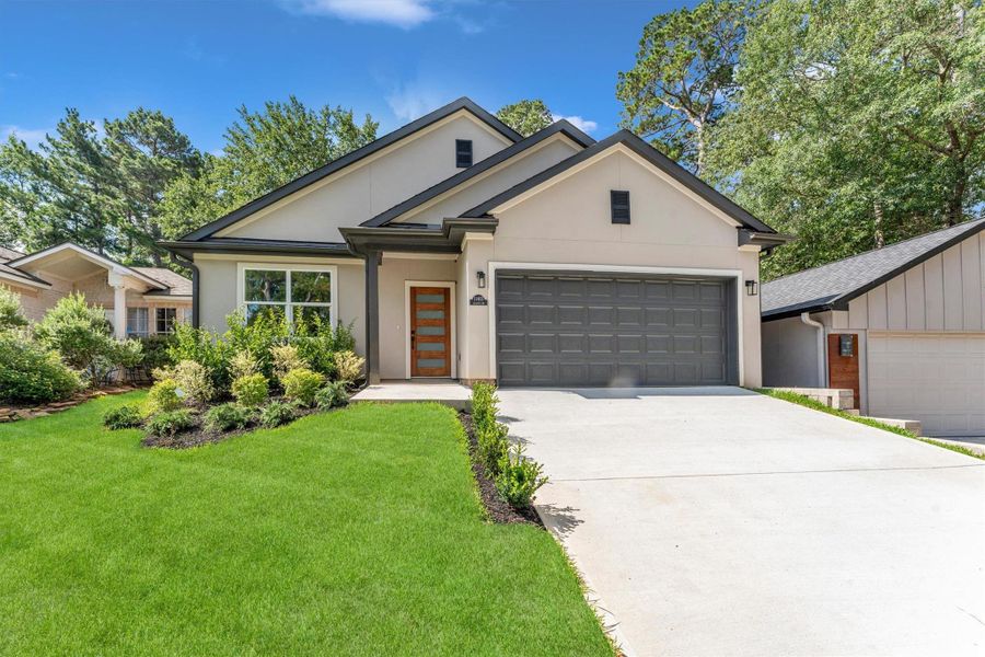 Front exterior of a new home in , Montgomery, TX, highlighting curb appeal (Image 32). Front exterior of a new home in , Montgomery, TX, highlighting curb appeal (Image 32).