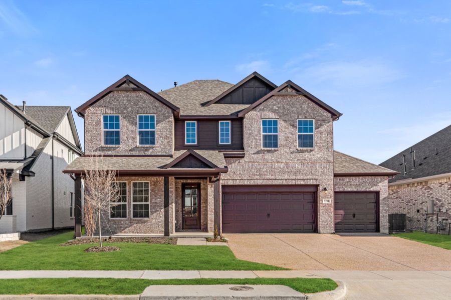 Representative exterior photo of a completed home built from the The Trinity Executive by UnionMain Homes in Lake Breeze, Lavon, TX (Image 23).