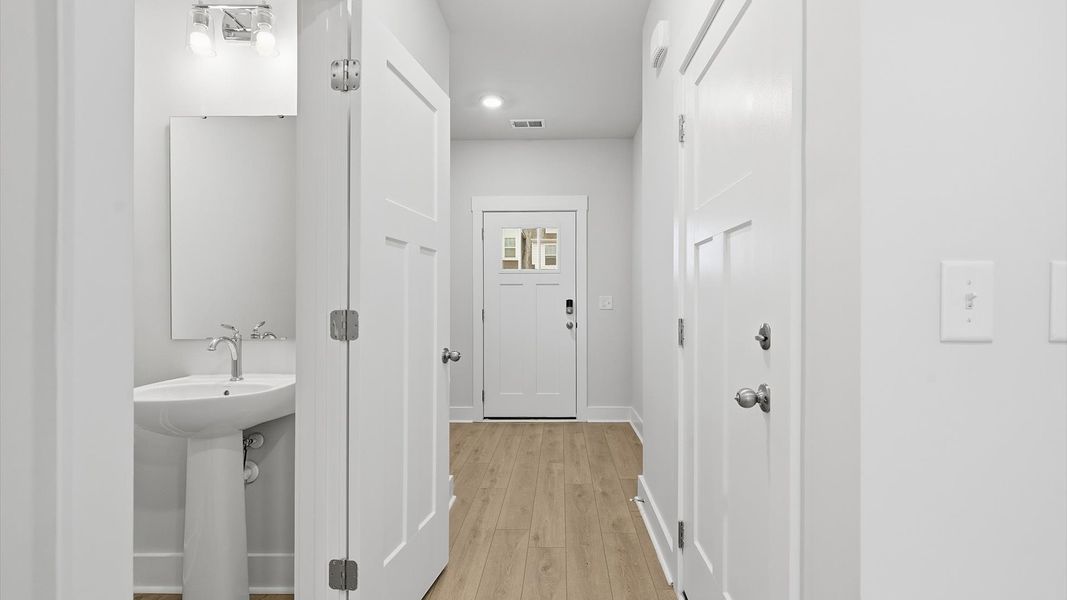 Vibrant entry highlighted by hardwood floors and accomplished design choices near Downtown Greer Vibrant entry highlighted by hardwood floors and accomplished design choices near Downtown Greer