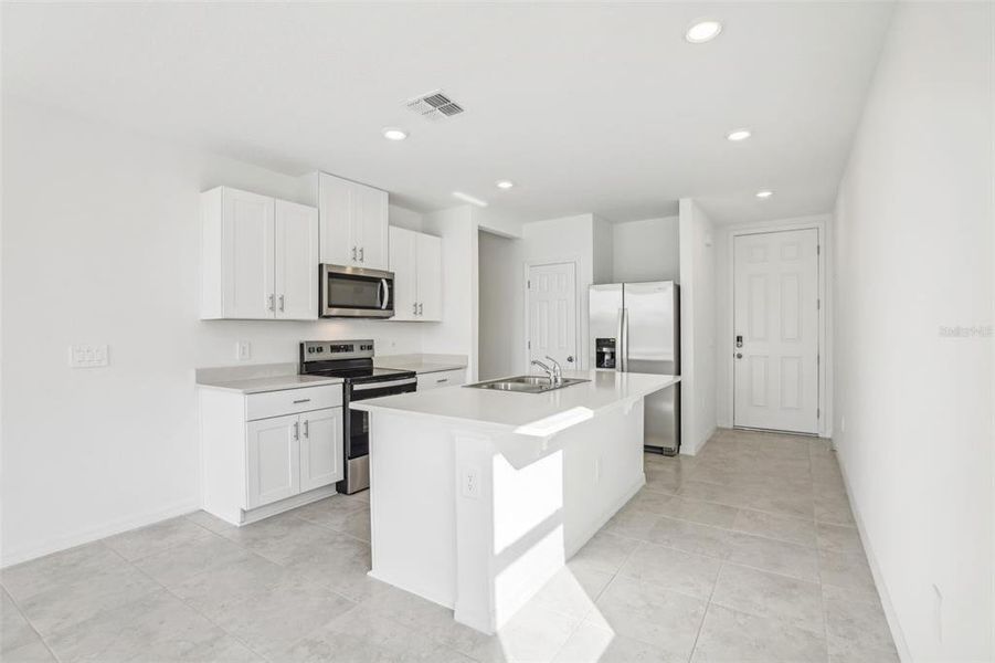Furnished interior view inside a new home in Lake Deer Estates - Classic Series, Poinciana (Image 4).