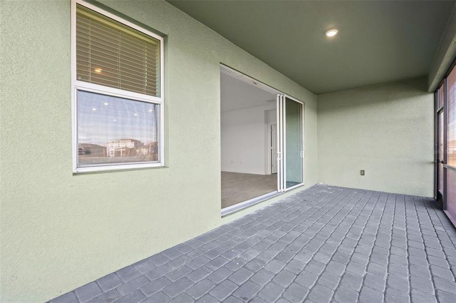 Exterior details and patio area of a home in Rye Ranch, Parrish (Image 2).