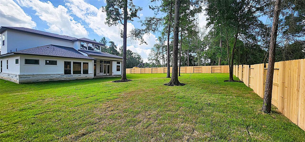 Front exterior of a new home in Stewart’s Forest, Conroe, TX, highlighting curb appeal (Image 14). Front exterior of a new home in Stewart’s Forest, Conroe, TX, highlighting curb appeal (Image 14).