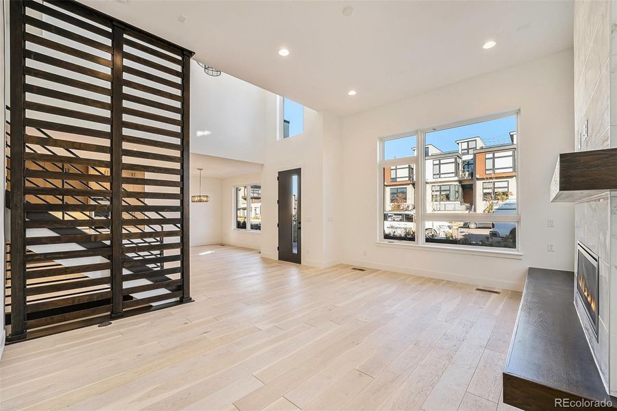 Living room with 12 foot ceilings in open main level