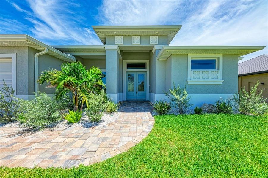 Front exterior of a new home in , Rotonda West, FL, highlighting curb appeal (Image 2). Front exterior of a new home in , Rotonda West, FL, highlighting curb appeal (Image 2).