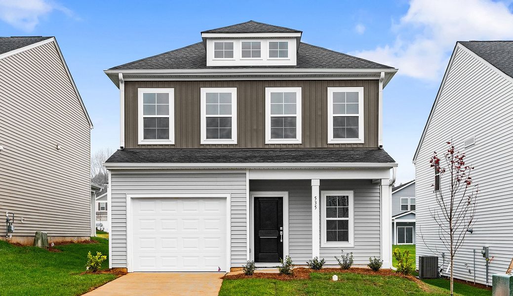 Front exterior of a new home in Hanes Lake, Winston-Salem, NC, highlighting curb appeal (Image 1).