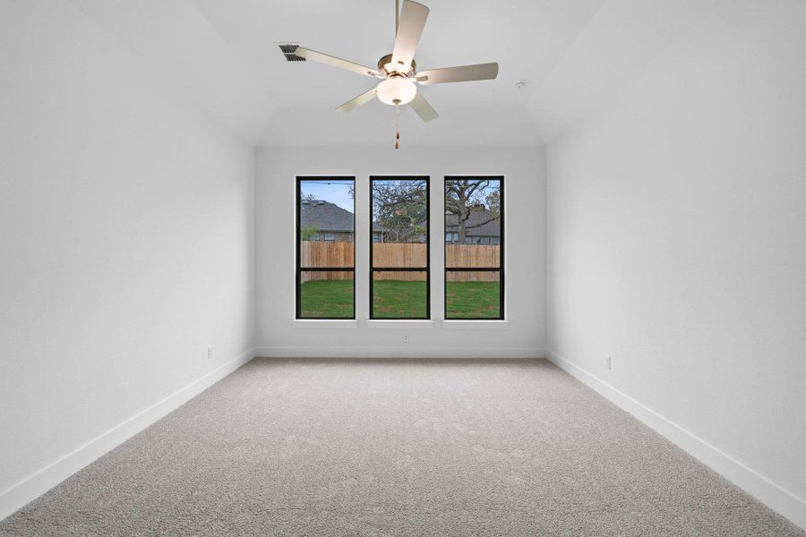 Primary Bedroom with elevated ceiling