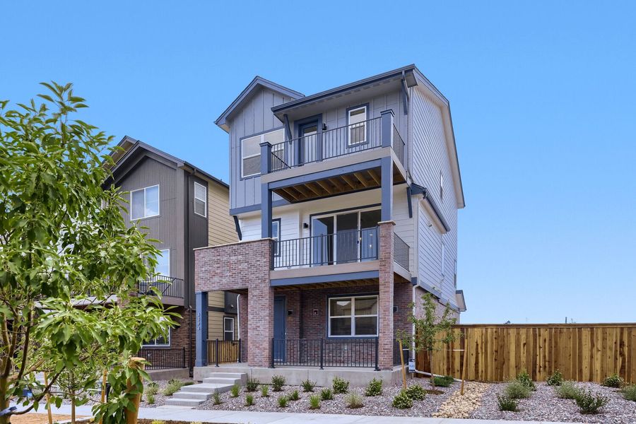 Front exterior of a new home in Uplands, Westminster, CO, highlighting curb appeal (Image 2). Front exterior of a new home in Uplands, Westminster, CO, highlighting curb appeal (Image 2).