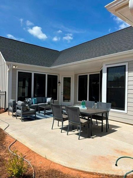 Exterior details and patio area of a home in The Courtyards at Hodges Farm, Charlotte (Image 29).