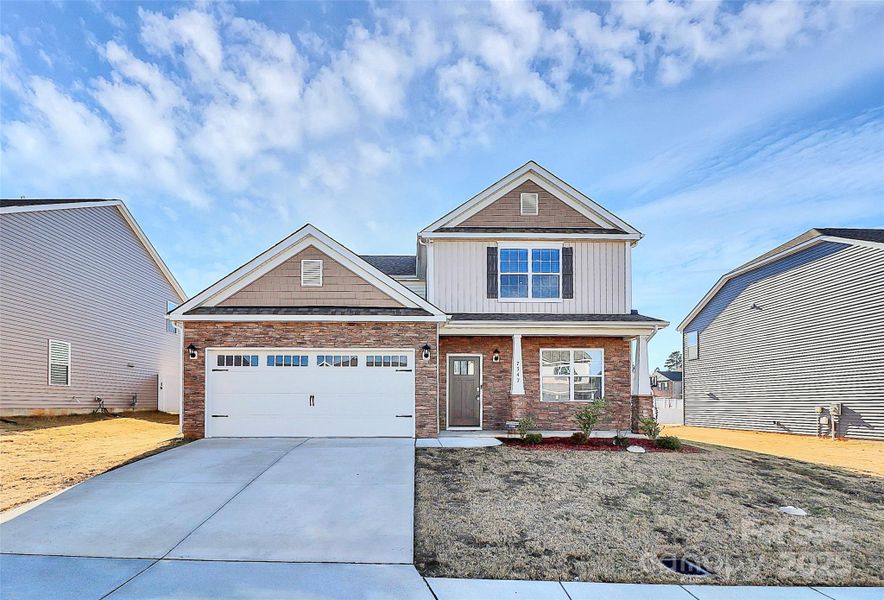 Front exterior of a new home in , Gastonia, NC, highlighting curb appeal (Image 19).