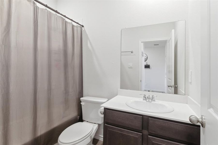 Bathroom with vanity and shower / tub combo Bathroom with vanity and shower / tub combo