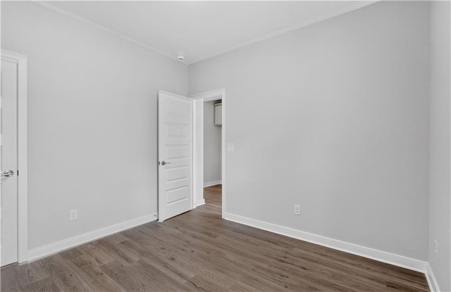 Spacious, unfurnished interior of a new home in The Cottages at East Lanier, Fayetteville (Image 12).