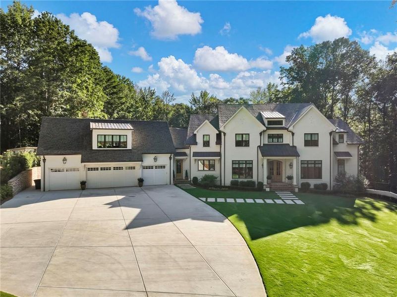 Front exterior of a new home in , Buford, GA, highlighting curb appeal (Image 28). Front exterior of a new home in , Buford, GA, highlighting curb appeal (Image 28).