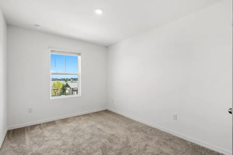 Spacious, unfurnished interior of a new home in Catamaran Cove, Rockledge (Image 29).