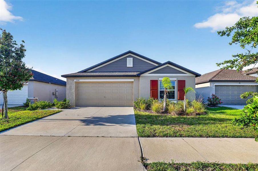 Front exterior of a new home in , Riverview, FL, highlighting curb appeal (Image 2). Front exterior of a new home in , Riverview, FL, highlighting curb appeal (Image 2).