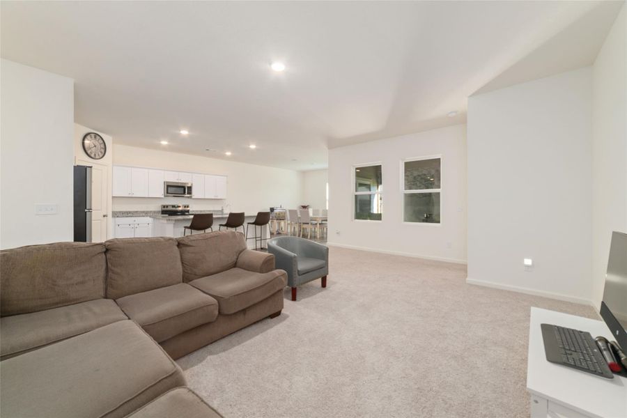Furnished interior view inside a new home in Sunterra, Katy (Image 6).