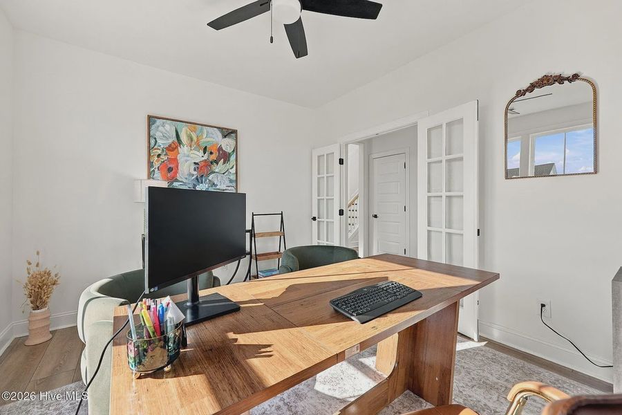 Furnished interior view inside a new home in Dixon Grove, Grimesland (Image 6).