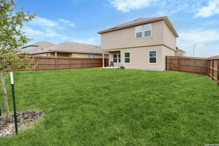 Exterior details and patio area of a home in Avenida, Converse (Image 24).