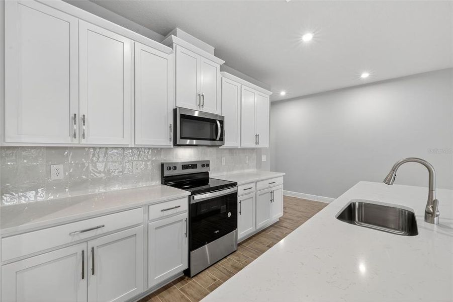 Furnished interior view inside a new home in Windwater, Parrish (Image 5).