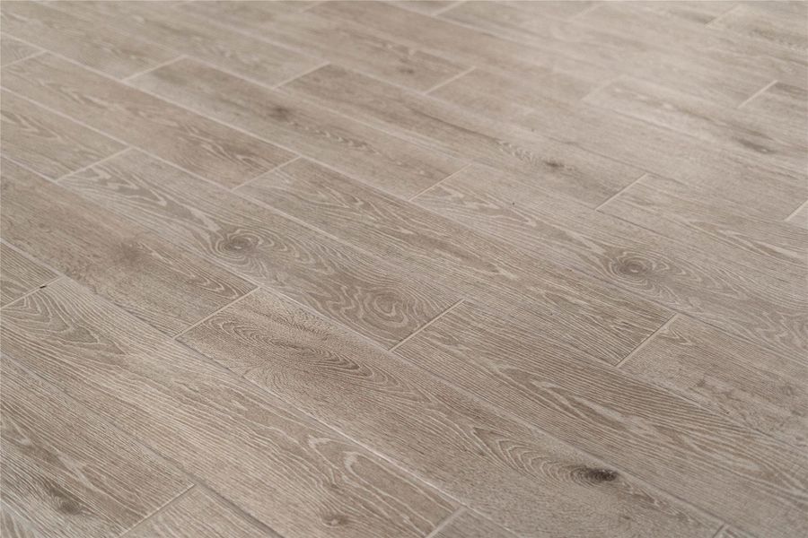 Wood-look tile flooring.