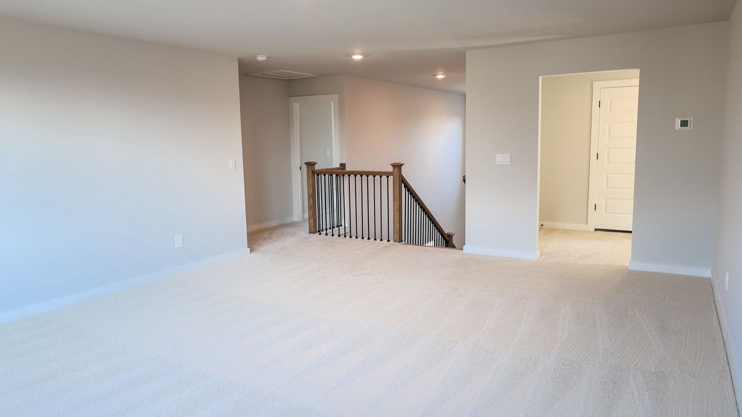 Representative unfurnished interior of a home built from the STONEBROOK II by D.R. Horton in Harvest Point, Spring Hill (Image 49).