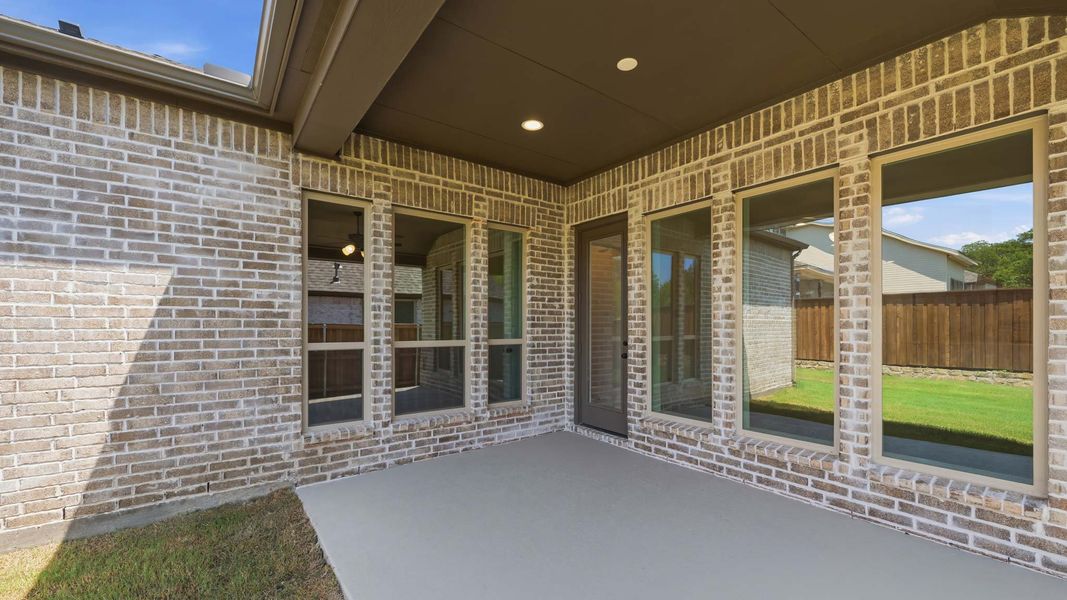 Exterior details and patio area of a home in Trinity Falls, McKinney (Image 3).