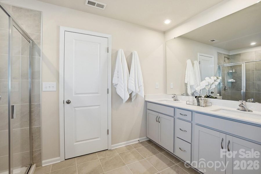 Furnished interior view inside a new home in Waxhaw Landing, Monroe (Image 13).
