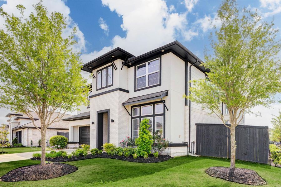 Front exterior of a new home in , Richmond, TX, highlighting curb appeal (Image 25).