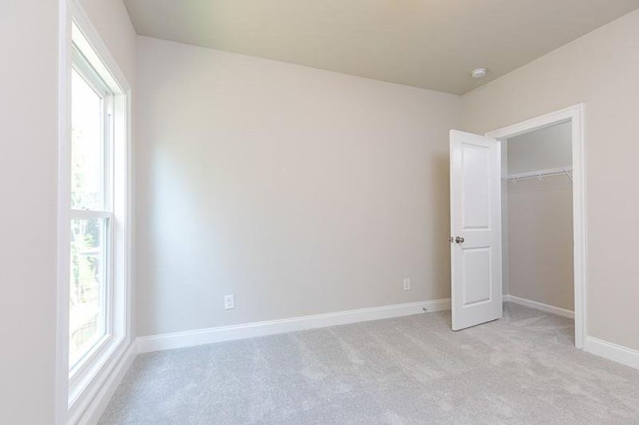 Spacious, unfurnished interior of a new home in Waterhaven, Cumming (Image 19).