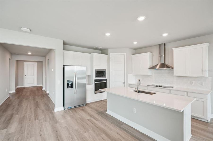 Furnished interior view inside a new home in Crescent Lakes - Signature Series, Punta Gorda (Image 10).