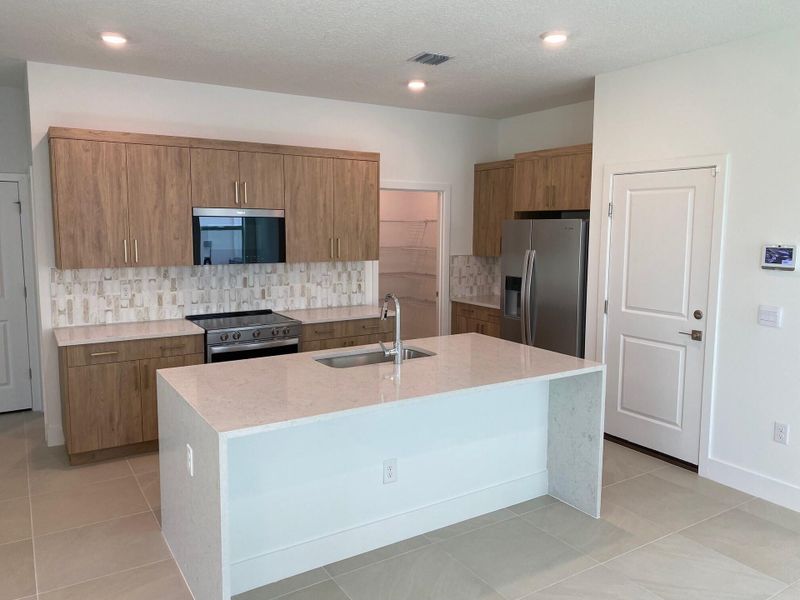 Furnished interior view inside a new home in Preserves at Park Trace, Stuart (Image 4).