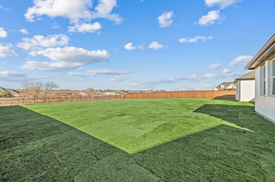 Exterior details and patio area of a home in NorthGlen, Haslet (Image 26).