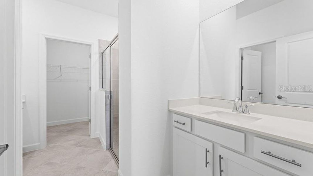 Furnished interior view inside a new home in Palm Lake at Coco Bay, Englewood (Image 9).