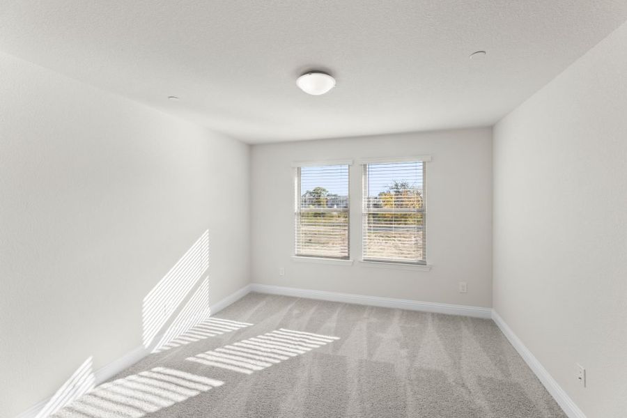 Representative exterior photo of a completed home built from the Lavon by Impression Homes in Timber Ridge, Corinth, TX (Image 19).