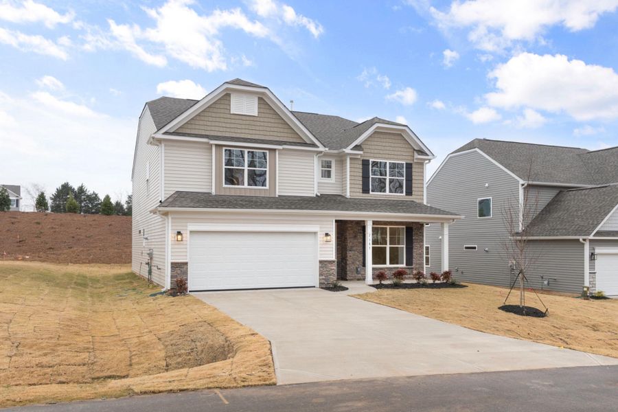 Front exterior of a new home in Pisgah Park, Kernersville, NC, highlighting curb appeal (Image 25).