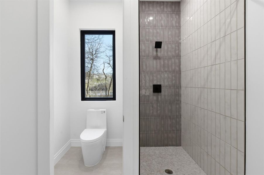 Walk in shower and water close in ensuite bath.