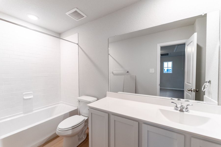 Furnished interior view inside a new home in Hennersby Hollow, San Antonio (Image 8). Furnished interior view inside a new home in Hennersby Hollow, San Antonio (Image 8).