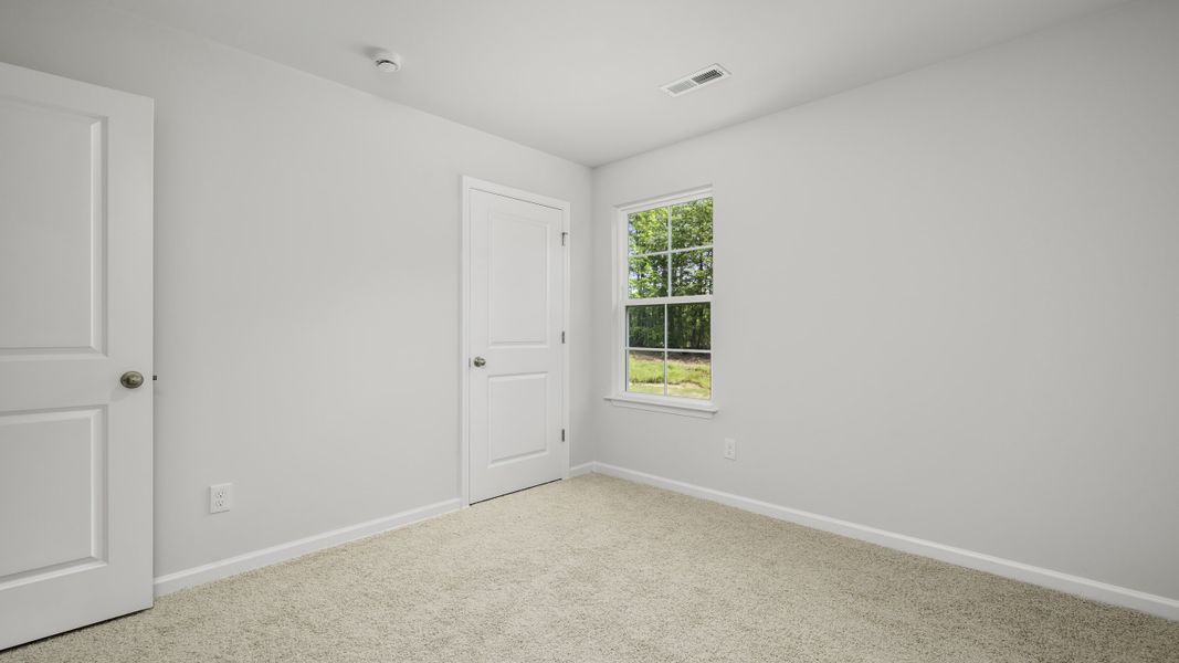 Spacious, unfurnished interior of a new home in Greystone North, Stoneville (Image 15).