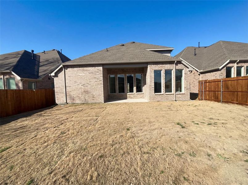 Exterior details and patio area of a home in Shaded Tree, McKinney (Image 4).