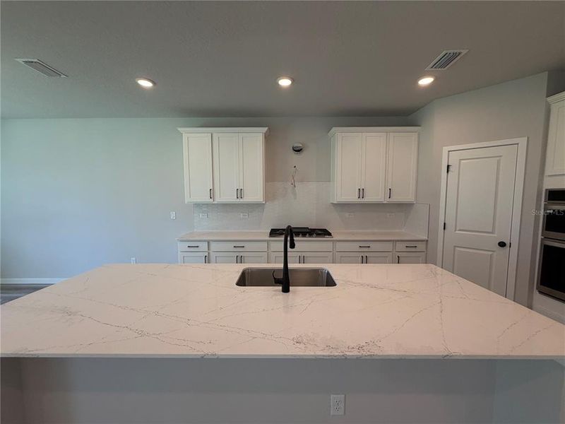 Furnished interior view inside a new home in Reserve East, Flagler Beach (Image 8).