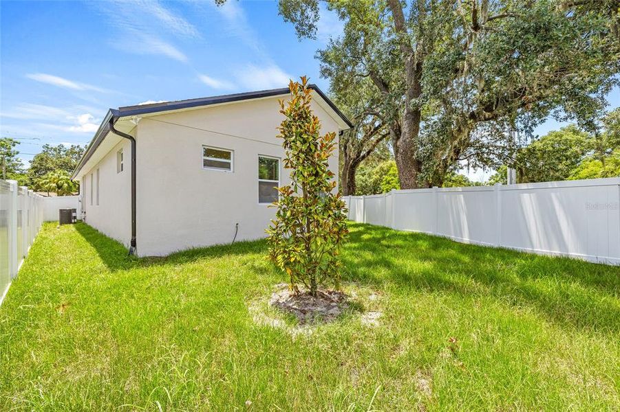 Front exterior of a new home in , Tampa, FL, highlighting curb appeal (Image 23).