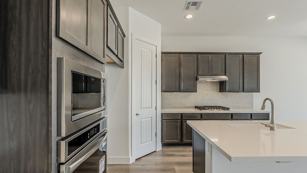 Furnished interior view inside a new home in Hacienda at Estrella, Goodyear (Image 8).