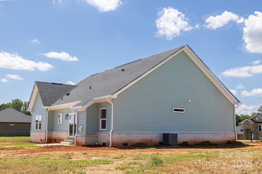 Front exterior of a new home in , Statesville, NC, highlighting curb appeal (Image 1).